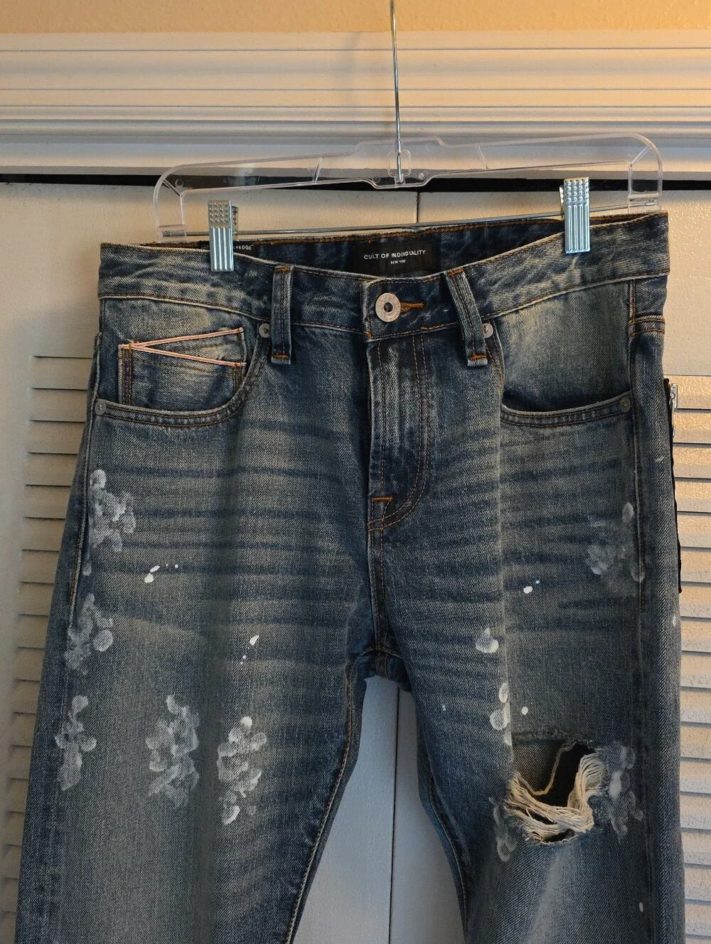 Cult of Individuality Distressed Skinny Jeans in Faded Blue with Zipper Cuffs